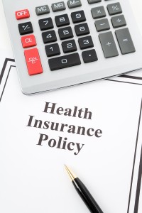 bigstockphoto_health_insurance_policy_5009314