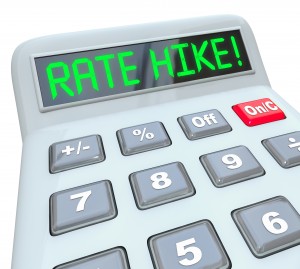 Rate Hike words in green letters on a calculator display to illu