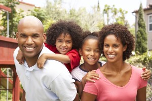 Portrait of Happy Family In Garden