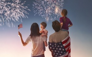 Patriotic holiday. Happy family, parents and daughters children